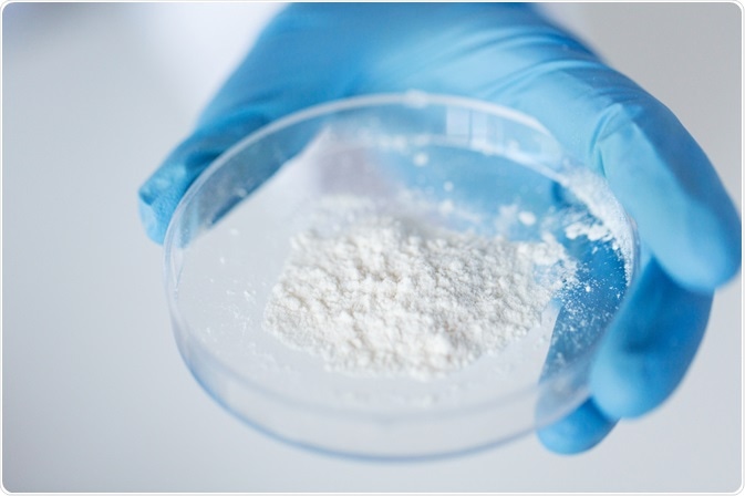 Scientist analyzing white powder