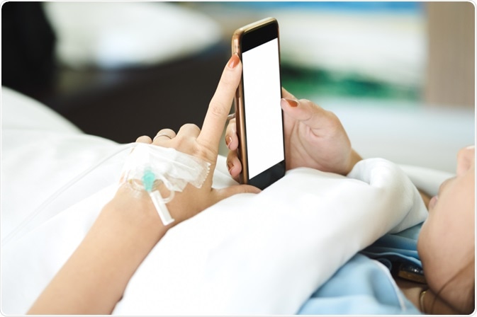 Patient on phone in hospital Patient on phone in hospital