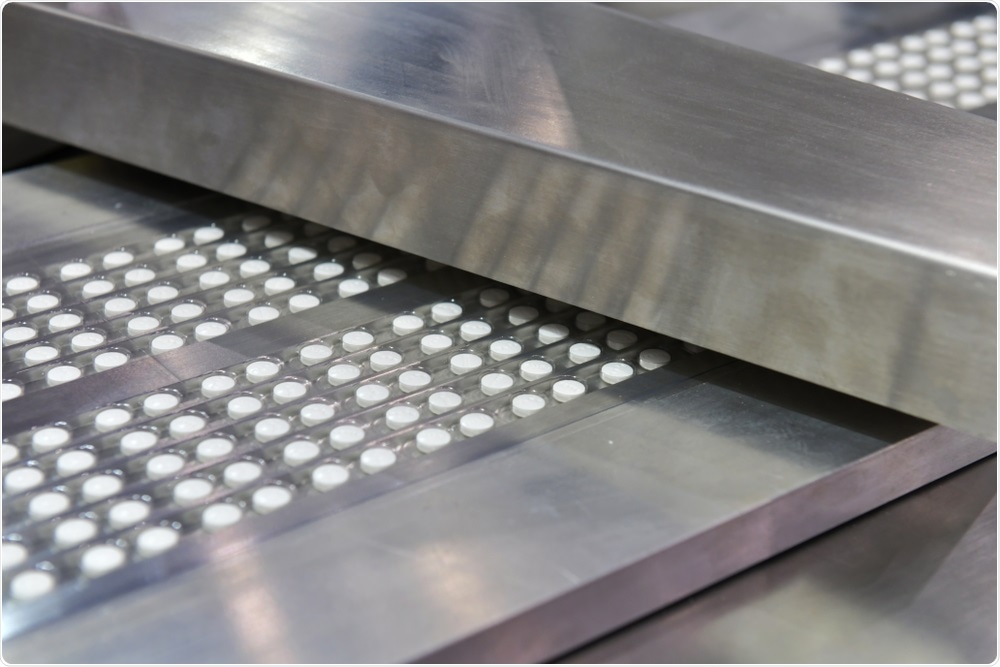 Pills being manufactured.