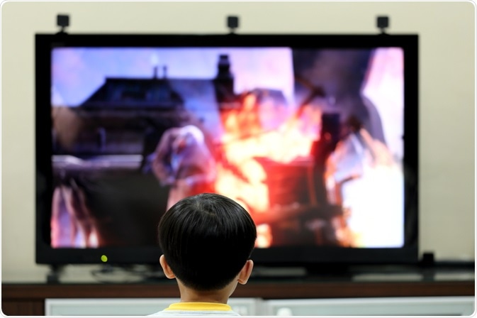 Child in front of screen Child in front of screen