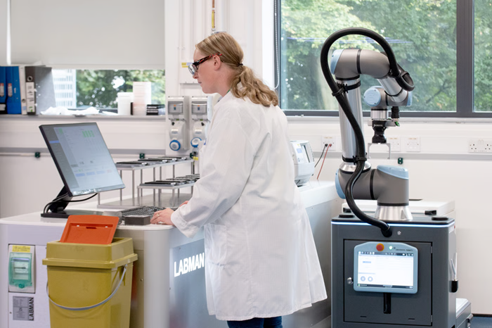 Lynn Dobson analyzing results on a PC.
